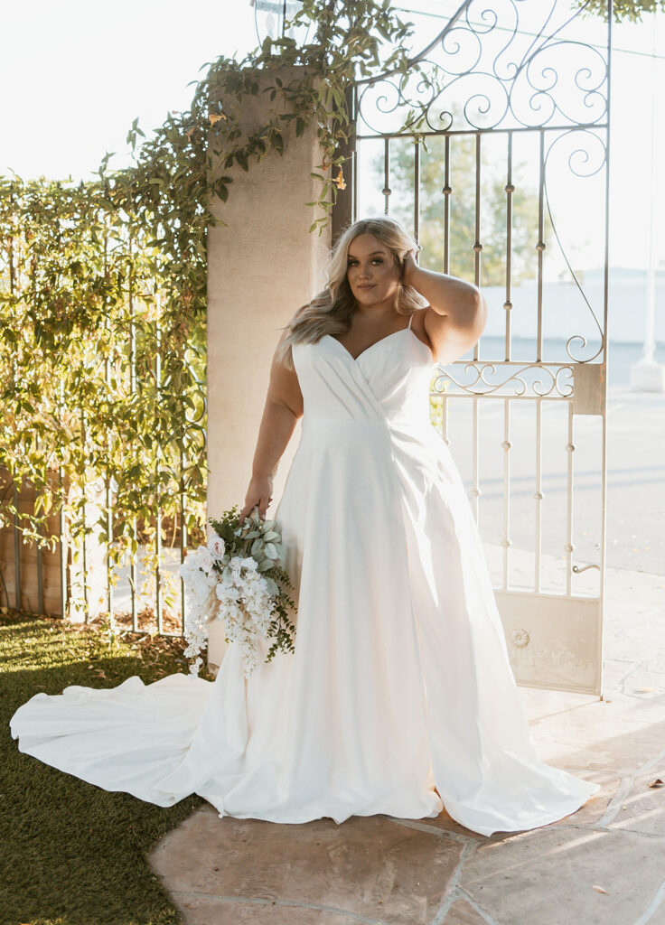 traditional wedding gown with a clean look and a unique neckline