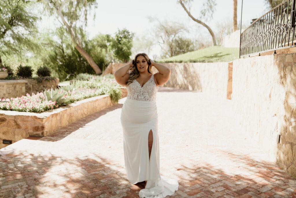 plus size wedding gown with mixed material and a slit