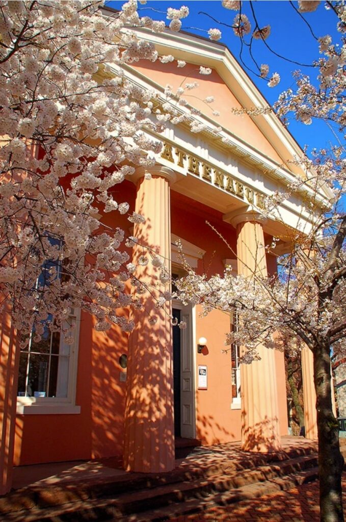 The facade of the Athenaeum, a greek-inspired venue in Northern Virginia