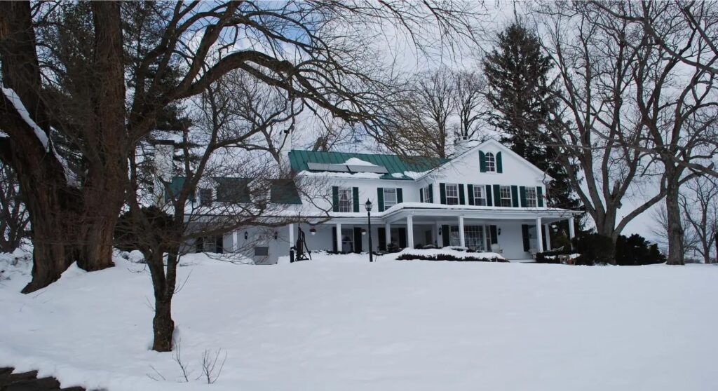 The exterior of the Briar Patch Bed & Breakfast Inn with snow on the ground in Northern Virginia